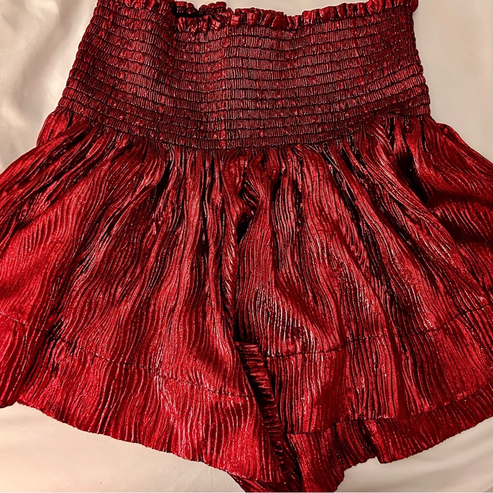 Never worn. Brand new. Queen of Sparkles skort. Shiny red.